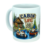 Enjoy your favorite beverage in the Mug: Cabin Life Gnomes Ceramic Coffee Mug (11 oz) by Nordic Wholesale. This cabin-themed ceramic mug features whimsical gnome illustrations relaxing by a serene lake and cozy cabin, surrounded by trees, a canoe, and a river float. The text playfully reads: CABIN LIFE—No WiFi, no worries, just beer & bad decisions—making this coffee mug the perfect addition to any rustic retreat.