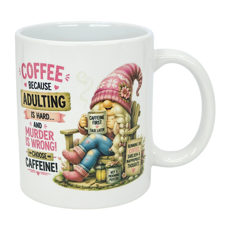 The Nordic Wholesale “Choose Caffeine Tomte” 11 oz ceramic mug features a Nordic gnome in a pink hat and boots, coffee in hand. The mug displays the text: “Coffee because adulting is hard… and murder is wrong! Choose caffeine!”.