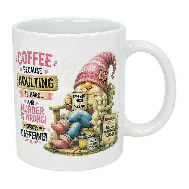 The Nordic Wholesale “Choose Caffeine Tomte” 11 oz ceramic mug features a Nordic gnome in a pink hat and boots, coffee in hand. The mug displays the text: “Coffee because adulting is hard… and murder is wrong! Choose caffeine!”.