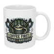 The Nordic Wholesale Mug: Coffee First Pillage and Raid Later Ceramic Mug (11 oz) displays crossed axes, a steaming cup, and bold text—ideal for anyone who loves coffee with Viking humor.