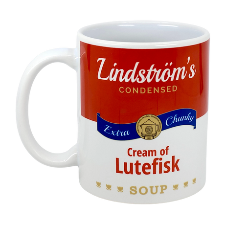 Celebrate Scandinavian heritage with the Swedish Gift Store’s 11oz ceramic mug, designed like a classic soup can and featuring Lindstrom's Condensed Extra Chunky Cream of Lutefisk Soup—a unique gift for anyone who loves Lindstrom, Minnesota.