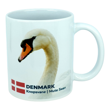 Elevate your kitchen with the Nordic Wholesale Mug: Denmark National Animal Mute Swan Ceramic Mug (11 oz), a white mug showcasing a graceful mute swan, the Danish flag, and the text "DENMARK Knopsvane | Mute Swan." This charming Scandinavian mug is a delightful way to honor Danish heritage in your home.