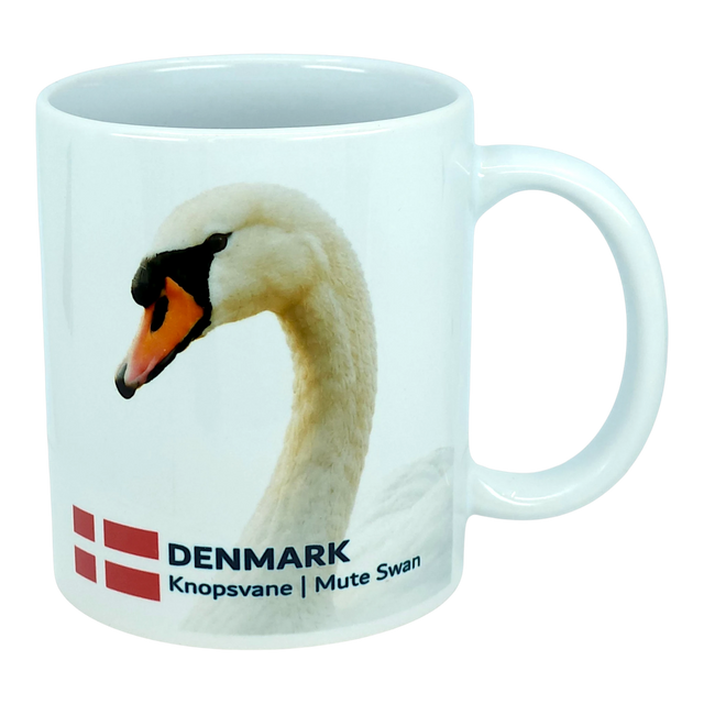 Elevate your kitchen with the Nordic Wholesale Mug: Denmark National Animal Mute Swan Ceramic Mug (11 oz), a white mug showcasing a graceful mute swan, the Danish flag, and the text "DENMARK Knopsvane | Mute Swan." This charming Scandinavian mug is a delightful way to honor Danish heritage in your home.