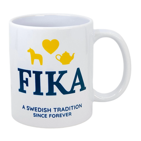 Introducing the Mug: Fika — A Swedish Tradition Since Forever Ceramic Mug (11 oz) by Nordic Wholesale. This white mug features "FIKA" in blue lettering, highlighted with a yellow heart, horse, and teapot above it. Beneath, it reads “A Swedish Tradition Since Forever.” Celebrate the warmth and timeless joy of Scandinavian coffee culture with this charming Fika mug—the perfect tribute to an enduring Swedish tradition.