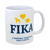 A white 11 oz ceramic mug from Nordic Wholesale featuring the word “FIKA,” yellow icons of a horse, heart, and teapot, with “A Swedish Tradition Since Forever” printed below.