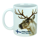 The Mug: Finland National Animal Reindeer Ceramic Mug (11 oz Capacity) by Nordic Wholesale is a white ceramic mug showcasing a reindeer head illustration alongside the text "FINLAND Poro | Reindeer" and a blue Finnish flag cross. This stylish mug is ideal for savoring your favorite hot beverages and adds a touch of Lapland charm to any coffee break.