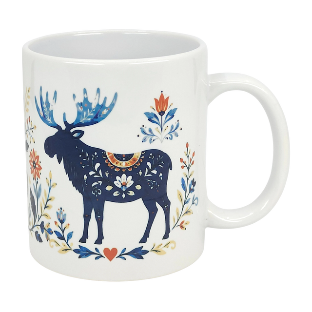 The Nordic Wholesale Mug: Folk Art Moose Ceramic Mug (11 oz) features a white ceramic design with a blue moose, colorful floral patterns, decorative flowers, leaves, and a red heart inspired by Scandinavian folk art.