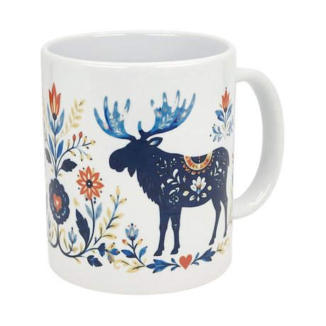 The Nordic Wholesale Mug: Folk Art Moose Ceramic Mug (11 oz) features a folk-style moose illustration surrounded by decorative blue, red, and yellow Scandinavian-inspired floral patterns on white ceramic.