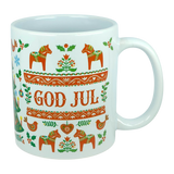 The Nordic Wholesale Mug: God Jul Dala Horse Christmas Ceramic Mug (11 oz Capacity) features Scandinavian folk art designs with red horses, hearts, and flowers. This charming mug displays the words "GOD JUL" in bold red letters at the center, surrounded by festive Nordic patterns.