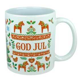 The Nordic Wholesale Mug: God Jul Dala Horse Christmas Ceramic Mug (11 oz Capacity) features Scandinavian folk art designs with red horses, hearts, and flowers. This charming mug displays the words "GOD JUL" in bold red letters at the center, surrounded by festive Nordic patterns.