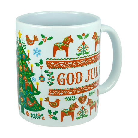 The Mug: God Jul Dala Horse Christmas Ceramic Mug (11 oz Capacity) by Nordic Wholesale features classic Nordic folk art motifs including a festive Christmas tree, red Dala horses, birds, hearts, and flowers. Decorated with the words "GOD JUL" in bright red and surrounded by holiday patterns, this charming Scandinavian coffee cup is perfect for celebrating the season.