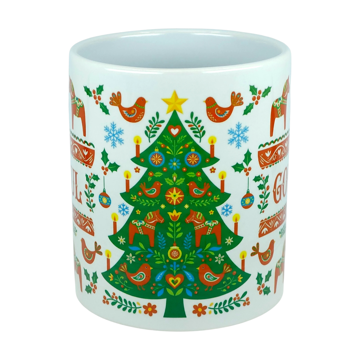 Enjoy festive Scandinavian cheer with the Mug: God Jul Dala Horse Christmas Ceramic Mug (11 oz Capacity) by Nordic Wholesale—a white ceramic mug featuring a decorated Christmas tree with ornaments, birds, and candles, surrounded by red, green, blue, and yellow folk art patterns inspired by traditional Nordic designs.
