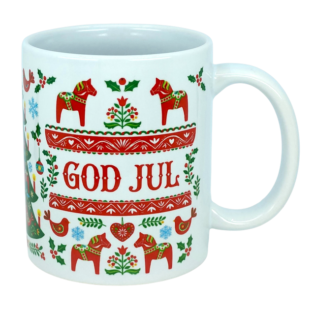 Celebrate Scandinavian traditions with the God Jul Dala Horse Christmas Ceramic Mug (11 oz Capacity) from Nordic Wholesale. This white ceramic mug features vibrant red and green Nordic folk art patterns, showcasing Dala horses, birds, trees, and "GOD JUL" in the center. It's the perfect coffee cup to add a festive touch to your holiday mornings or gift to lovers of charming Scandinavian decor.