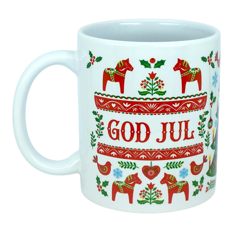 Presenting the Mug: God Jul Dala Horse Christmas Ceramic Mug (11 oz Capacity) by Nordic Wholesale—a white ceramic mug adorned with Scandinavian folk art, including red Dala horses, birds, hearts, and flowers. The center of the mug features "GOD JUL," Swedish for Merry Christmas.