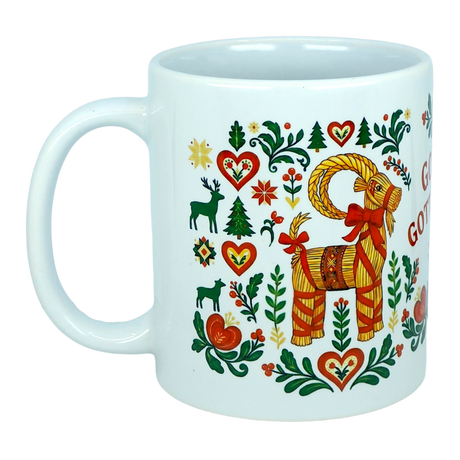 Celebrate the season with the Mug: God Jul Gott Nytt År Yule Goat Christmas Ceramic Mug (11 oz Capacity) from Nordic Wholesale. This white mug features a colorful Scandinavian-style design with a straw Yule Goat, red hearts, green leaves, a small Christmas tree, and a reindeer. With festive Nordic folk art charm, it's the perfect ceramic coffee cup for bringing "God Jul" spirit to your holiday table.