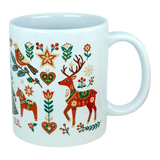 Experience festive Nordic tradition with the Mug: God Jul Nordic Folk Art Ceramic Mug (11 oz Capacity) by Nordic Wholesale, featuring a white Scandinavian design adorned with colorful folk art holiday motifs—reindeer, horses, birds, stars, hearts, and an array of flowers and branches in vibrant red, green, gold, and orange hues—a cheerful celebration of classic Scandinavian-style mug decor.