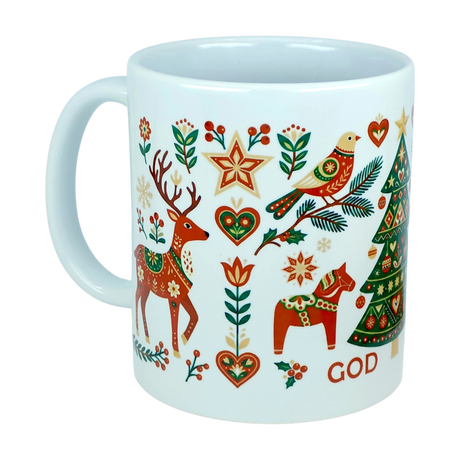 The Mug: God Jul Nordic Folk Art Ceramic Mug (11 oz Capacity) by Nordic Wholesale is a white ceramic mug adorned with vibrant Christmas-themed illustrations, such as a reindeer, horse, tree, bird, hearts, stars, and flowers. Inspired by traditional Nordic designs, this festive mug features the word "God Jul" partially visible at the bottom right.