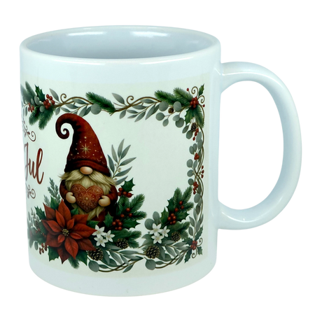 Celebrate the season with the Mug: God Jul Tomte Nordic Christmas Ceramic Mug (11 oz Capacity) from Nordic Wholesale. This white ceramic mug features a festive gnome holding a heart, surrounded by poinsettias, pinecones, holly, and greenery within a holiday-themed border. A charming Scandinavian design that brings a touch of Nordic cheer to your festivities.