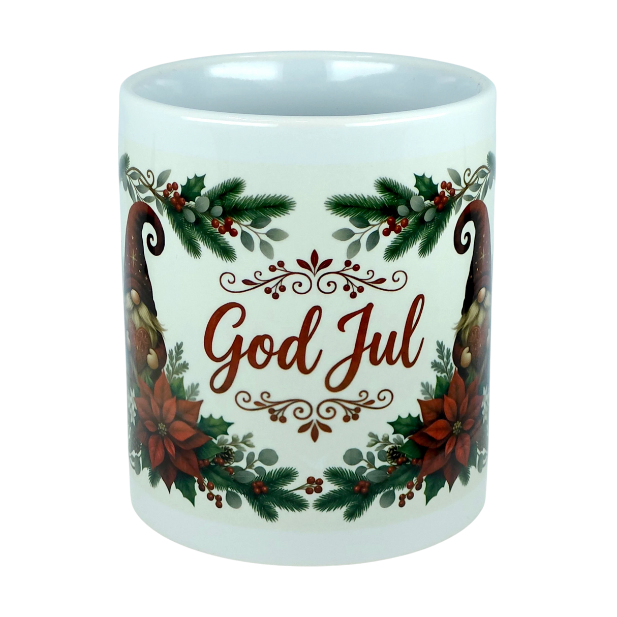 Introducing the Mug: God Jul Tomte Nordic Christmas Ceramic Mug (11 oz Capacity) by Nordic Wholesale—a white ceramic mug adorned with festive Christmas designs, including pine branches, red berries, and poinsettias. The phrase "God Jul" is featured prominently in red script at the center, making this charming Scandinavian-style mug ideal for your holiday celebrations.
