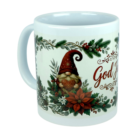 Introducing the God Jul Tomte Nordic Christmas Ceramic Mug by Nordic Wholesale—a white 11 oz mug featuring a festive Scandinavian design. The mug showcases a cheerful gnome in a red hat holding a heart, surrounded by vibrant poinsettias, holly, and greenery. The cozy holiday spirit is captured perfectly, with part of the “God Jul” text visible on the right side.