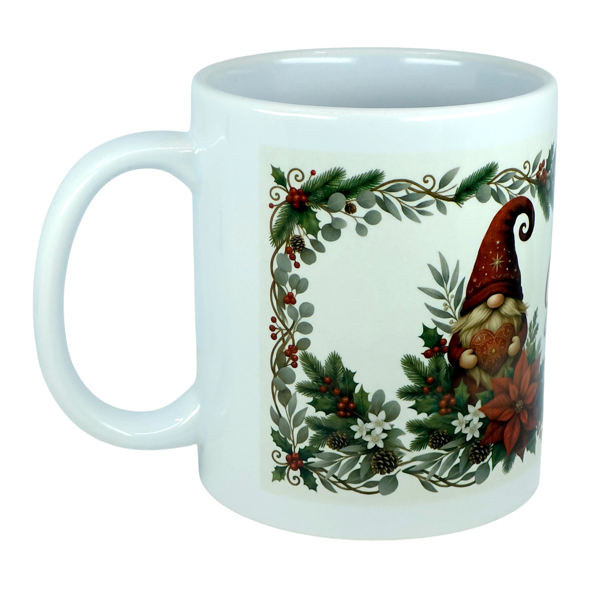The God Jul Tomte Nordic Christmas Ceramic Mug by Nordic Wholesale features a festive Scandinavian design with a gnome in a red hat, surrounded by greenery, pinecones, berries, and white flowers within a decorative border.