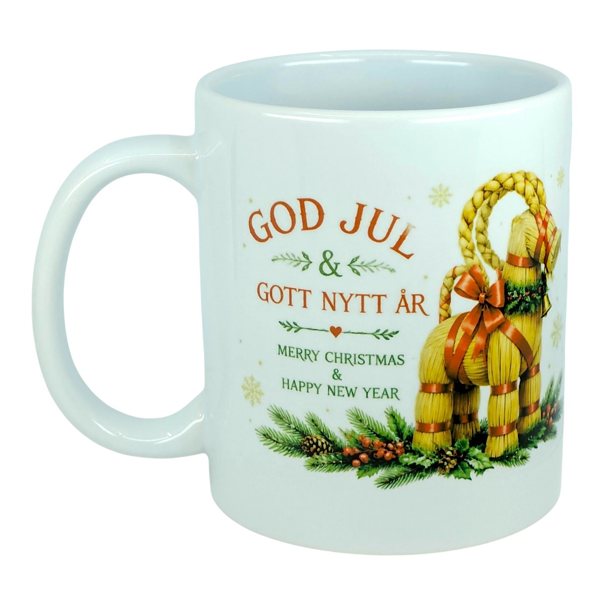 Celebrate the holidays with the Nordic Wholesale Mug: God Jul Yule Goat Ceramic Mug (11 oz Capacity), featuring a cheerful Swedish holiday greeting ("God Jul & Gott Nytt År") with English translation, festive greenery accents, and a decorative Swedish Julbock (straw Yule goat) on the side—a perfect classic Scandinavian mug for Yule Goat lovers this season.