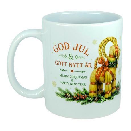 Celebrate the holidays with the Nordic Wholesale Mug: God Jul Yule Goat Ceramic Mug (11 oz Capacity), featuring a cheerful Swedish holiday greeting ("God Jul & Gott Nytt År") with English translation, festive greenery accents, and a decorative Swedish Julbock (straw Yule goat) on the side—a perfect classic Scandinavian mug for Yule Goat lovers this season.
