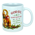 Introducing the Mug: God Jul Yule Goat Ceramic Mug (11 oz Capacity) by Nordic Wholesale—a white ceramic mug adorned with a charming Swedish Yule Goat, pine, and berries. Featuring festive text in red and green that reads: "GOD JUL & GOTT NYTT ÅR, Merry Christmas & Happy New Year," this Scandinavian Christmas mug is perfect for adding a touch of Nordic tradition to your holiday celebrations.