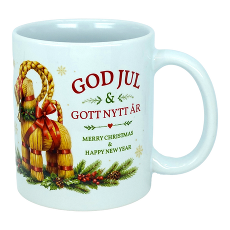 Introducing the Mug: God Jul Yule Goat Ceramic Mug (11 oz Capacity) by Nordic Wholesale—a white ceramic mug adorned with a charming Swedish Yule Goat, pine, and berries. Featuring festive text in red and green that reads: "GOD JUL & GOTT NYTT ÅR, Merry Christmas & Happy New Year," this Scandinavian Christmas mug is perfect for adding a touch of Nordic tradition to your holiday celebrations.