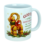 The Mug: God Jul Yule Goat Ceramic Mug (11 oz Capacity) by Nordic Wholesale features a charming image of a straw Yule goat adorned with a red ribbon, pine branches, and berries. The mug displays the text "God Jul & Gott Nytt År" alongside "Merry Christmas & Happy New Year." Perfect for bringing Swedish and Scandinavian Christmas tradition to your holiday celebrations.