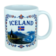 Introducing the Mug: Iceland Church Mountain Ceramic Mug (11 oz Capacity) by Nordic Wholesale. This white ceramic mug features "ICELAND," the Icelandic flag, and a picturesque scene of mountains, a church, water, and icebergs. A decorative blue and red floral border frames the Nordic landscape, making this mug an ideal gift for anyone celebrating their Icelandic heritage.
