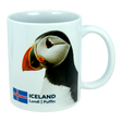 This 11 oz ceramic coffee mug from Nordic Wholesale, the "Mug: Iceland National Animal Puffin," features a photo of an Icelandic puffin alongside the Icelandic flag, with "ICELAND Lundi | Puffin" printed below the image—making it the perfect Nordic wildlife mug for nature lovers.