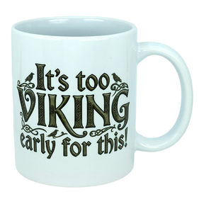 Start your day with a smile using the Mug: It's Too Viking Early For This White Ceramic Mug (11 oz) from Nordic Wholesale. This playful mug features bold black lettering that proclaims "It’s too VIKING early for this!"—a whimsical nod to Norse humor—paired with two small bird illustrations perched on the design, adding a charming touch. Perfect for coffee lovers who enjoy a mythic twist to their morning routine!.