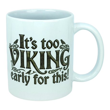 Start your day with a smile using the Mug: It's Too Viking Early For This White Ceramic Mug (11 oz) from Nordic Wholesale. This playful mug features bold black lettering that proclaims "It’s too VIKING early for this!"—a whimsical nod to Norse humor—paired with two small bird illustrations perched on the design, adding a charming touch. Perfect for coffee lovers who enjoy a mythic twist to their morning routine!.