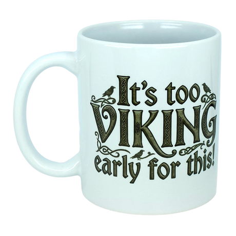 The Mug: It’s Too Viking Early For This White Ceramic Mug (11 oz) by Nordic Wholesale features playful black lettering and small bird illustrations, blending Norse humor with a quirky design perfect for Viking enthusiasts.