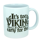Start your day with a smile using the Mug: It's Too Viking Early For This White Ceramic Mug (11 oz) by Nordic Wholesale. This charming white ceramic mug features the playful phrase “It’s Too VIKING Early For This” in a decorative font, complete with whimsical bird illustrations accenting some of the letters—a perfect choice for anyone who loves Norse humor with their morning coffee.