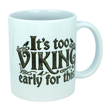 Start your day with a smile using the Mug: It's Too Viking Early For This White Ceramic Mug (11 oz) by Nordic Wholesale. This charming white ceramic mug features the playful phrase “It’s Too VIKING Early For This” in a decorative font, complete with whimsical bird illustrations accenting some of the letters—a perfect choice for anyone who loves Norse humor with their morning coffee.