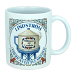 Introducing the Nordic Wholesale Mug: Lindstrom America's Little Sweden Ceramic Coffee Mug (11 oz)—featuring a charming decorative design with a water tower labeled "Välkommen till Lindström," surrounded by floral motifs inspired by Scandinavian folk art and the phrase "Lindstrom, America’s Little Sweden." A perfect mug for celebrating your Swedish heritage.