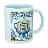 The Mug: Lindstrom America's Little Sweden Ceramic Coffee Mug (11 oz) by Nordic Wholesale features the phrase “Lindström: America's Little Sweden” and an illustration of a water tower labeled “Välkommen till Lindström,” all beautifully accented with Scandinavian folk art floral designs and traditional red Dala horses—a charming Swedish heritage piece for any mug collection.