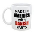 Celebrate your heritage with the Swedish Gift Store's "Mug: Made in America with Danish Parts" 11 oz ceramic mug, featuring bold black and red lettering on both sides—perfect for any proud Danish-American.