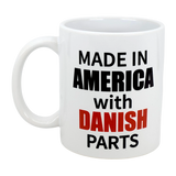 Celebrate your heritage with the Swedish Gift Store's "Mug: Made in America with Danish Parts" 11 oz ceramic mug, featuring bold black and red lettering on both sides—perfect for any proud Danish-American.