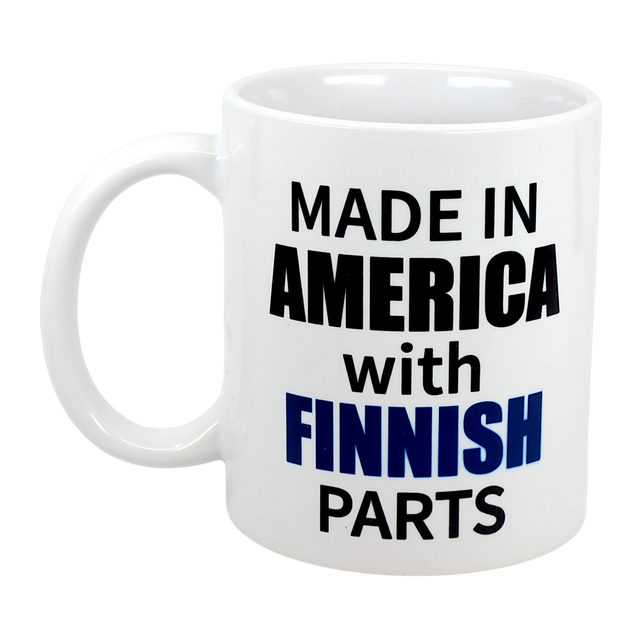 Celebrate your Finnish American roots with the Mug: Made in America with Finnish Parts Ceramic Mug (11 oz) by Swedish Gift Store, featuring bold black and blue lettering on a classic white mug.