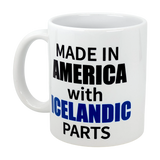 The Swedish Gift Store’s 11 oz ceramic mug, “Made in America with Icelandic Parts,” features AMERICA in bold black, ICELANDIC in bold blue, and the rest in standard black—perfect for celebrating Icelandic-American heritage.