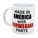 The Swedish Gift Store’s 11 oz ceramic mug features bold black and red text: “Made in America with Norwegian Parts”—a heritage gift perfect for celebrating your roots with every sip.