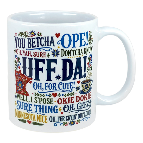 White ceramic mug with colorful Scandinavian-style patterns and visible Midwest sayings: UFF DA!, YOU BETCHA, OPE!, and SURE THING.