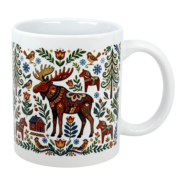 The Swedish Gift Store's 11 oz Mug: Nordic Forest Kurbits Dala Moose Wraparound Ceramic Mug features Nordic horses, a patterned moose, birds, a cabin, flowers, leaves, and snowflakes in colorful folk art style.