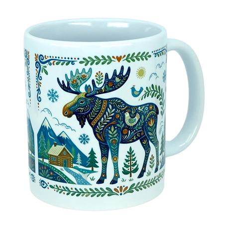 Enjoy your morning coffee with the Mug: Nordic Forest Moose Ceramic Mug (11 oz) from Nordic Wholesale, featuring a charming folk art design. This white ceramic mug is adorned with a vibrant, patterned illustration that captures a moose, pine trees, snowy mountains, a cozy cabin, decorative leaves, as well as a blue bird and sun in true Scandinavian style—adding a delightful Nordic flair to your daily routine.