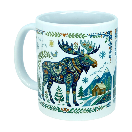 The Nordic Wholesale Mug: Nordic Forest Moose Ceramic Mug (11 oz) showcases a vibrant folk-art illustration of a moose surrounded by trees, a cabin, mountains, and intricate blue, green, and earth-toned patterns—an ideal choice for anyone who loves whimsical Scandinavian or Nordic design.
