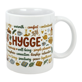 The Nordic Hygge Comfort Typography Ceramic Mug (11 oz) by Swedish Gift Store features “Hygge” with cozy icons—candles, tea, books, socks, blankets—and words like warmth and comfort. A Scandinavian mug perfect for relaxation and well-being.