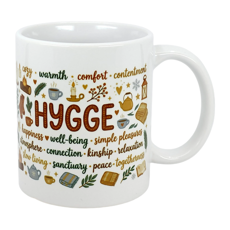 The Nordic Hygge Comfort Typography Ceramic Mug (11 oz) by Swedish Gift Store features “Hygge” with cozy icons—candles, tea, books, socks, blankets—and words like warmth and comfort. A Scandinavian mug perfect for relaxation and well-being.